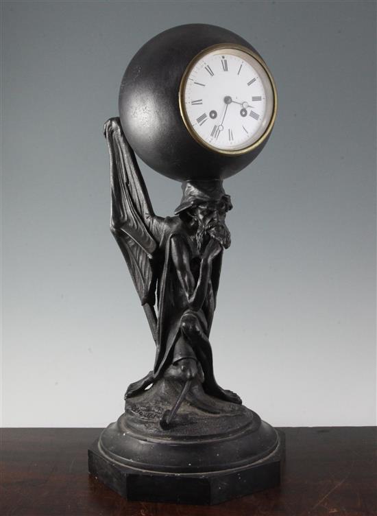 T. Lemaire. A cast iron mantel clock, 21in.